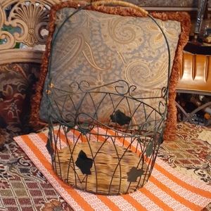 Large metal grape leaves basket.